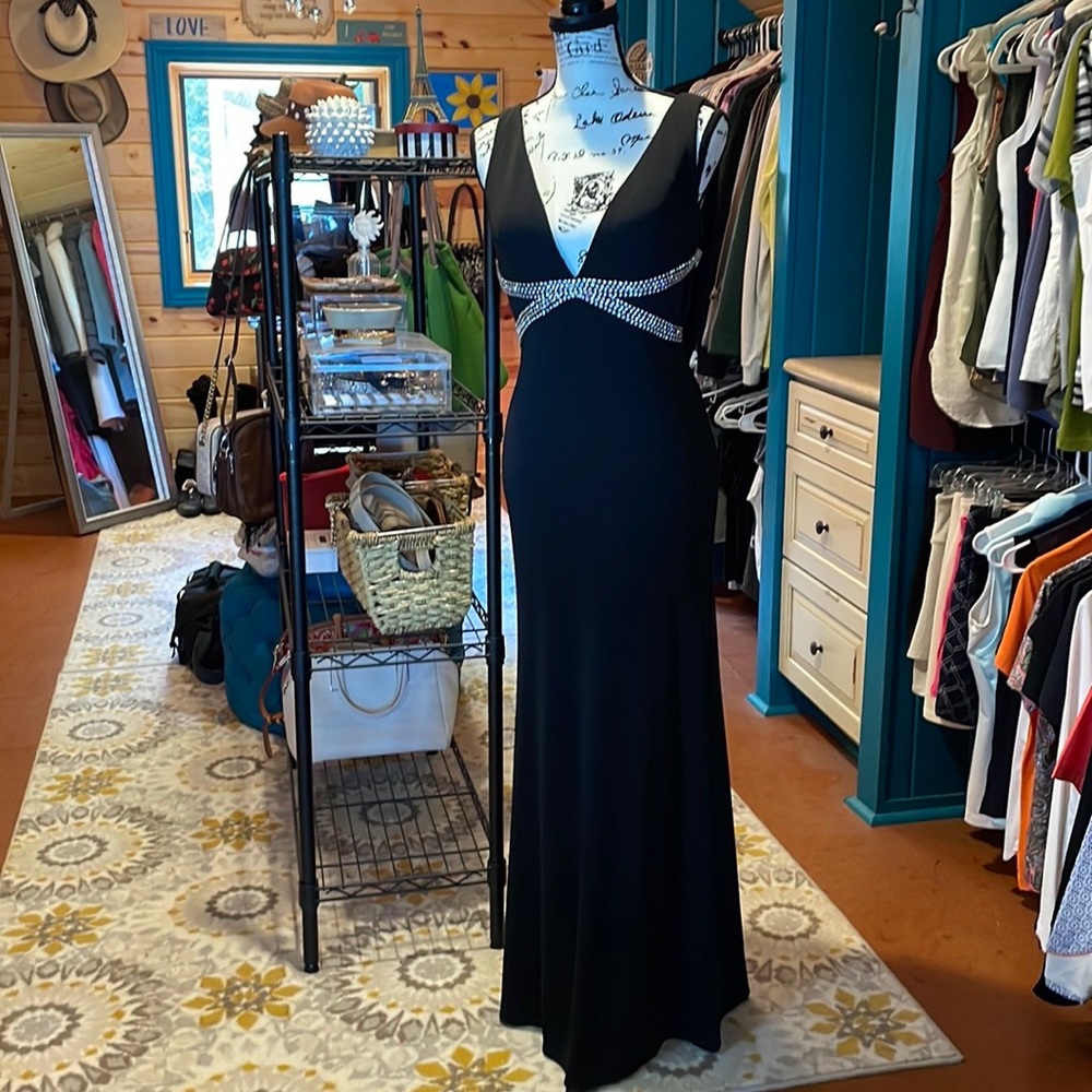 Long black gown, embellished with rhinestones.